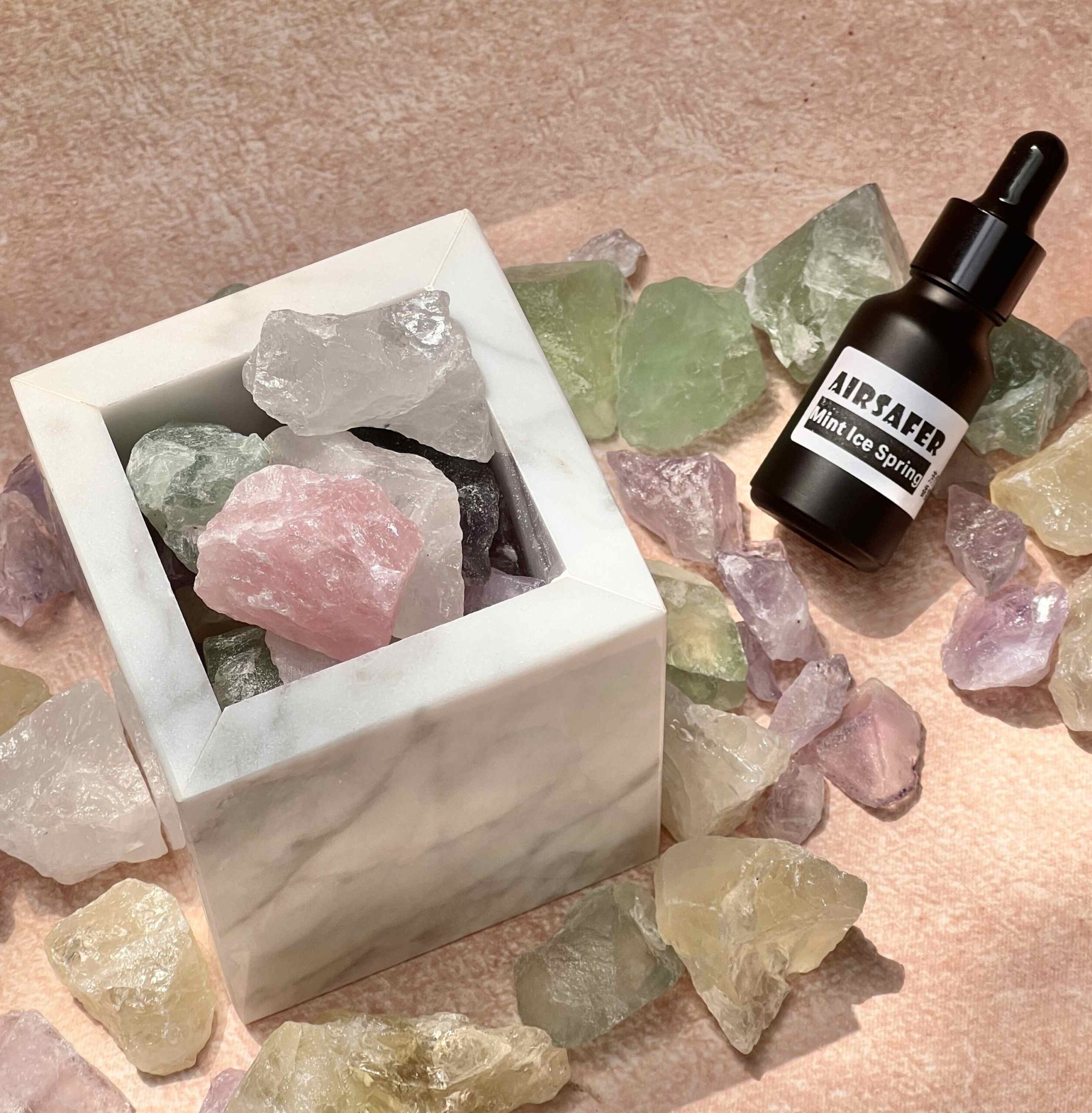 Alternate viewing angle focusing on the microporous surface texture of the natural marble stone, optimized for absorbing and diffusing essential oils.